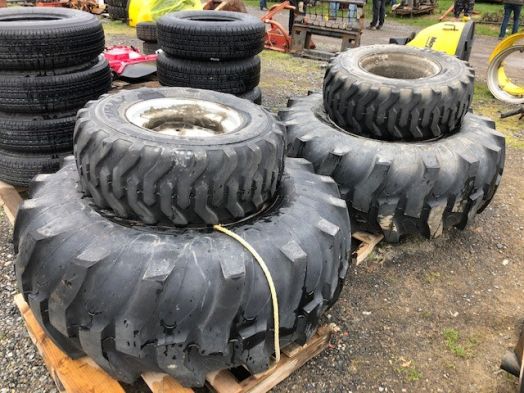 Set of 4 R4 Titan tires on rims