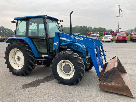 New Holland 7635 4x4 cab loader