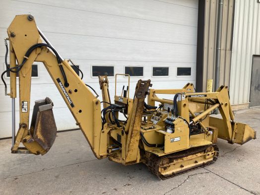 Struck Magnatrac Hydro MH5000 crawler loader backhoe