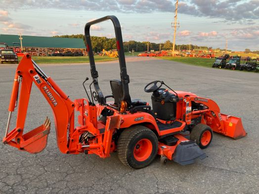 Kubota BX25 backhoe loader with mower