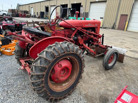 Farmall 100 tractor with snow blade
