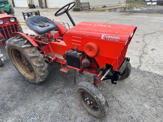 Economy 2414 tractor with mower, plow and cultivator