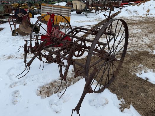 Antique kicker type hay tedder