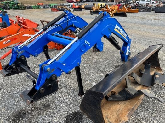 New Holland 655TL loader with brackets