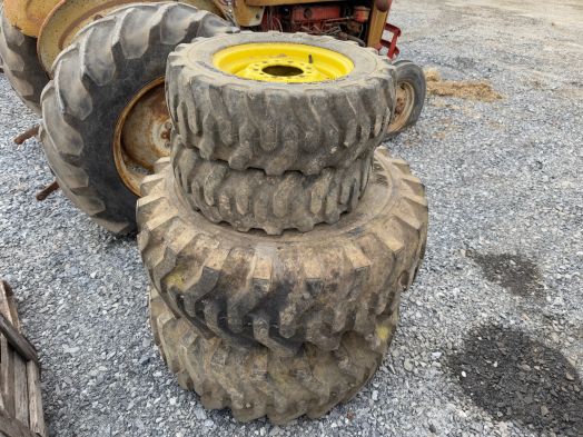 Titan R4 tires and rims off John Deere 4310