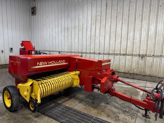 New Holland 311 small square baler with thrower. 