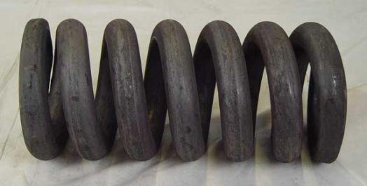 TRACK ADJUSTER SPRING