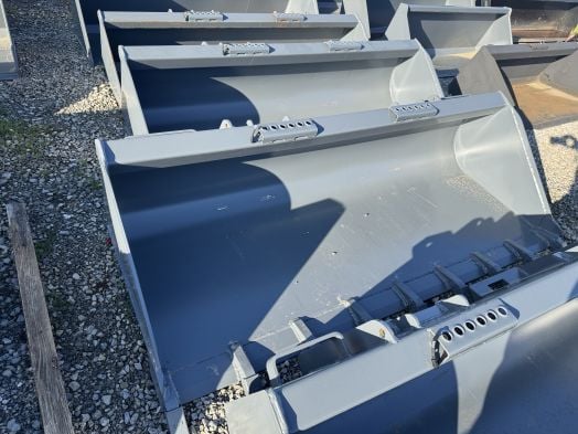 Gray 84" skid loader tooth bucket