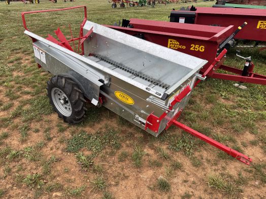 Loyal 23 bushel ground drive spreader