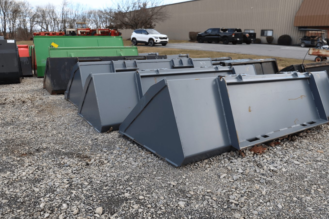 Large inventory of loaders and buckets